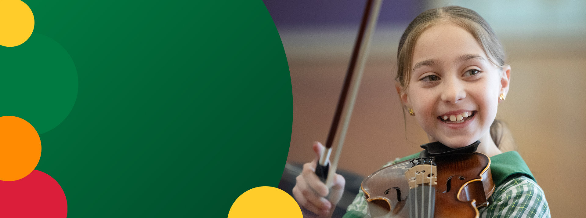 Student playing violin at St Mary MacKillop Primary School South Penrith