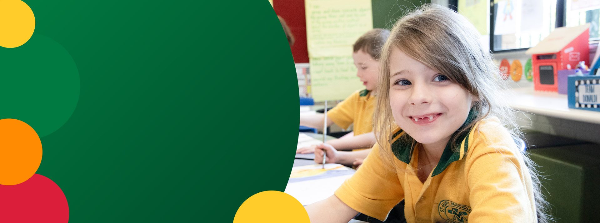 Student smiling in the classroom at St Mary MacKillop Primary School South Penrith