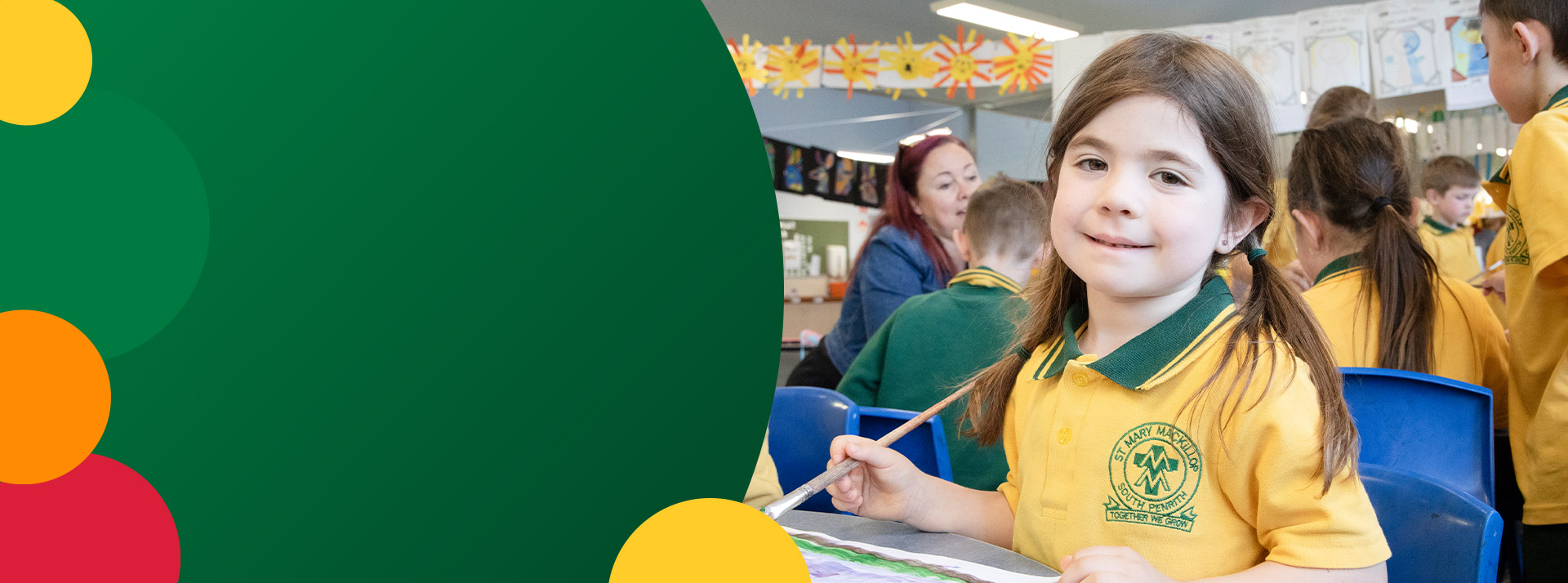Student painting in the classroom at St Mary MacKillop Primary School South Penrith