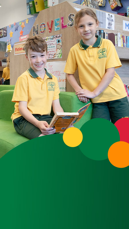 Students reading together in the library at St Mary MacKillop Primary School South Penrith