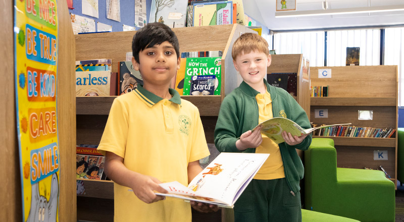 Students reading in the library at St Mary MacKillop Primary School South Penrith