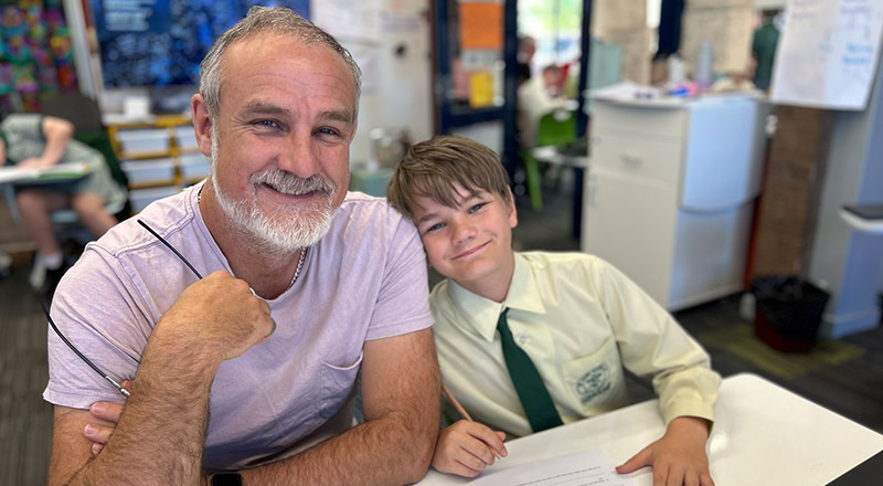 Student with his dad in the classroom at St Mary MacKillop Primary School South Penrith