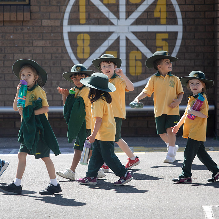 Students walking through the playground at St Mary MacKillop Primary School South Penrith