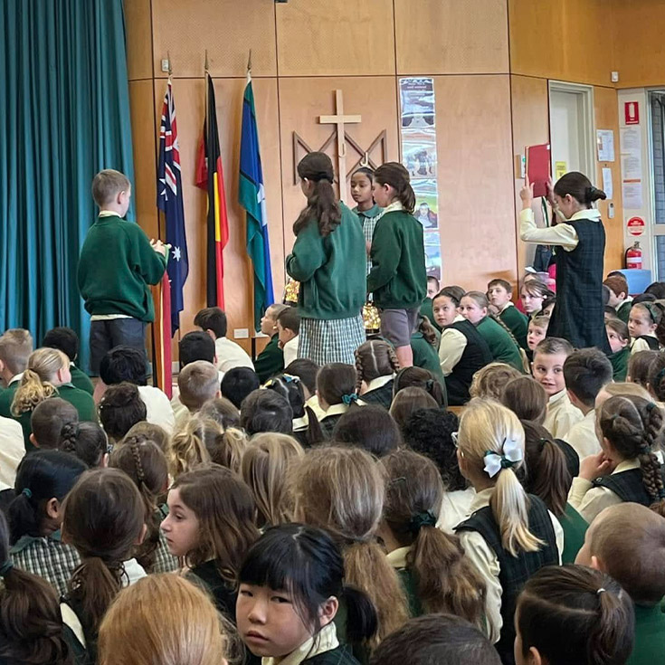 Students during a school liturgy at St Mary MacKillop Primary School South Penrith