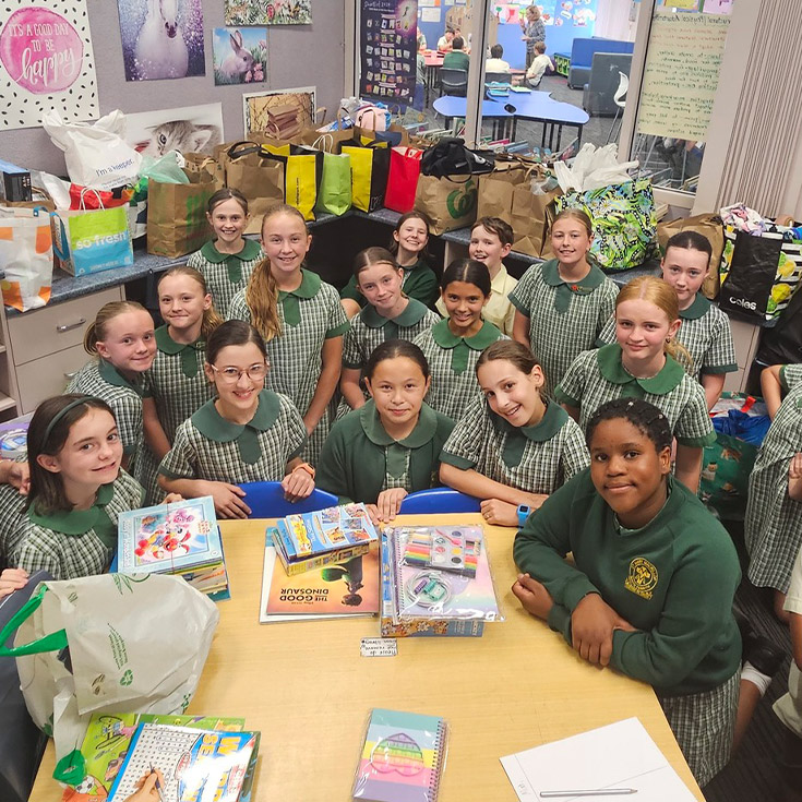 Students donating items to charity at St Mary MacKillop Primary School South Penrith