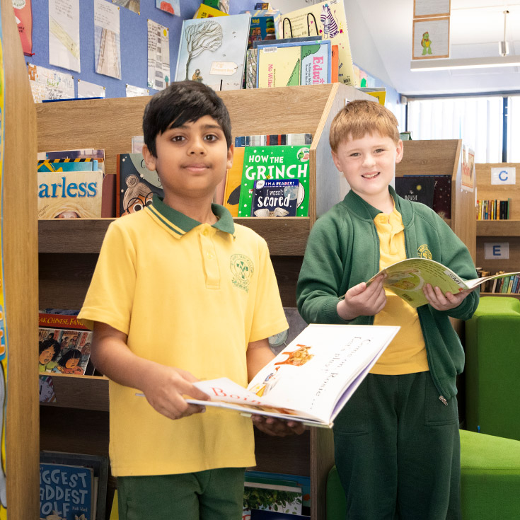 Students reading together in the library at St Mary MacKillop Primary School South Penrith